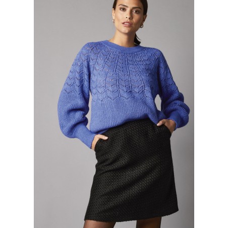Jupe courte trapèze en tweed, zippée au dos
